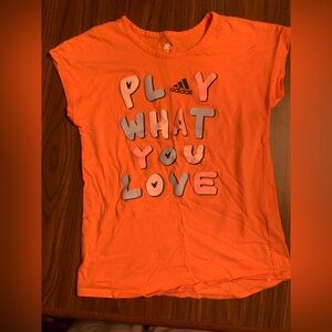 ADIDAS “PLAY WHAT YOU LOVE” GIRLS SHIRT
